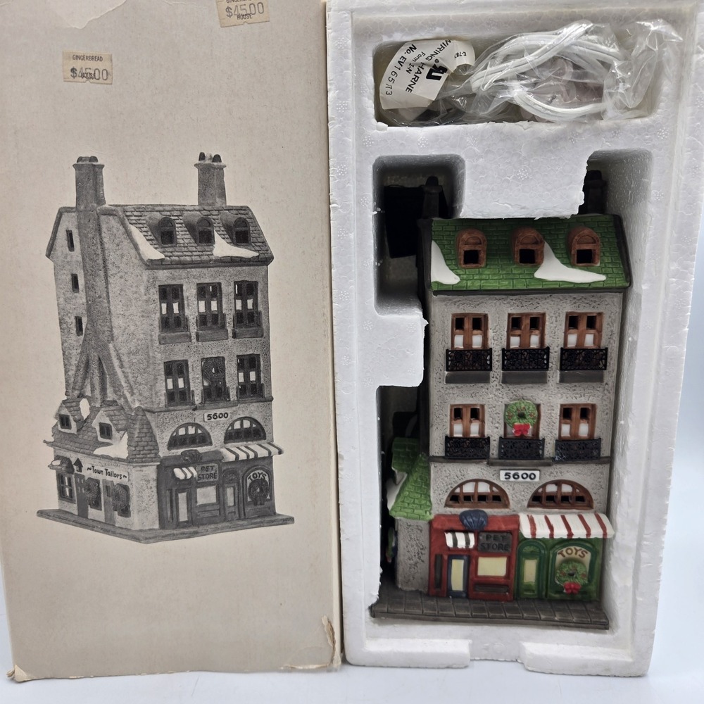 Department 56 Christmas in the City Toy Shop and Pet Store 65129 Town Tailors